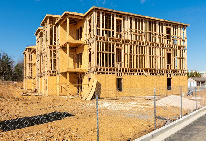 a panoramic view of temporary chain link fences on a construction site, separating work zones in Union City CA